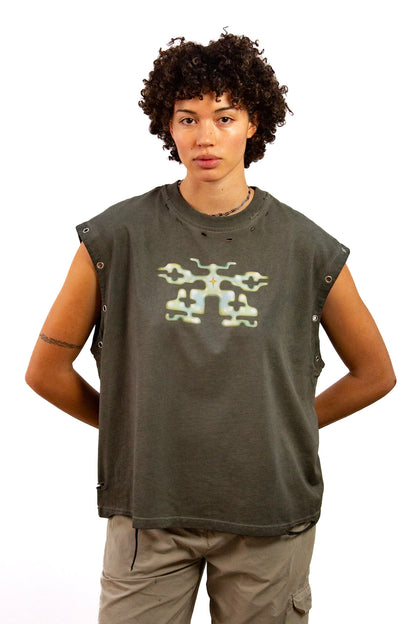 Light skinned androgynous model with natural curly hair wearing shirt in Stone grey